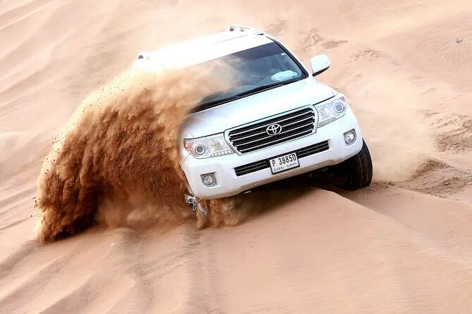 Premium Evening Desert Safari, Quad Bike, Camel & VIP BBQ Dinner - Quad biking at Al Madam