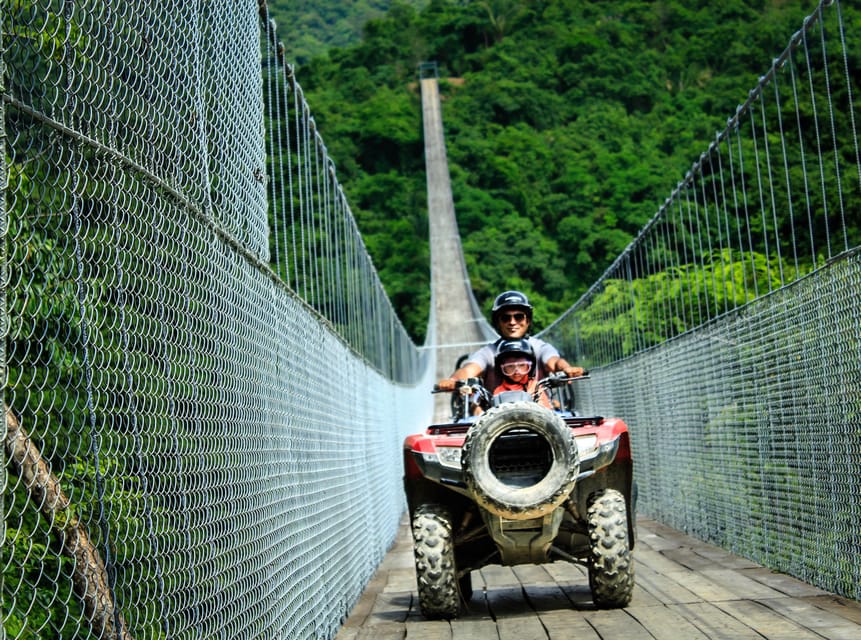 Puerto Vallarta: Jorullo Bridge ATV, Waterfall, Tequila Tour - Crossing Jorullo Bridge high above the river