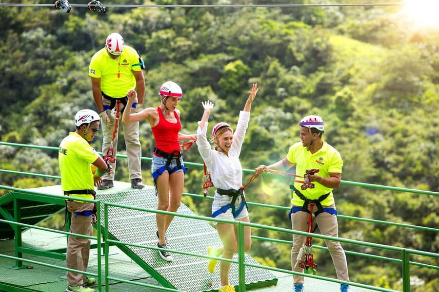 Punta Cana: Zipline, Chairlift, Buggy & Horse Ride Adventure - Ziplining across the forest
