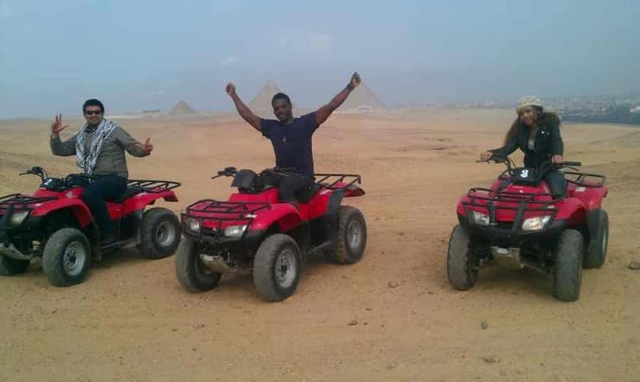 Pyramids of Giza: 1-Hour Quad Bike Desert Safari - Riding a quad bike beneath the Giza Pyramids