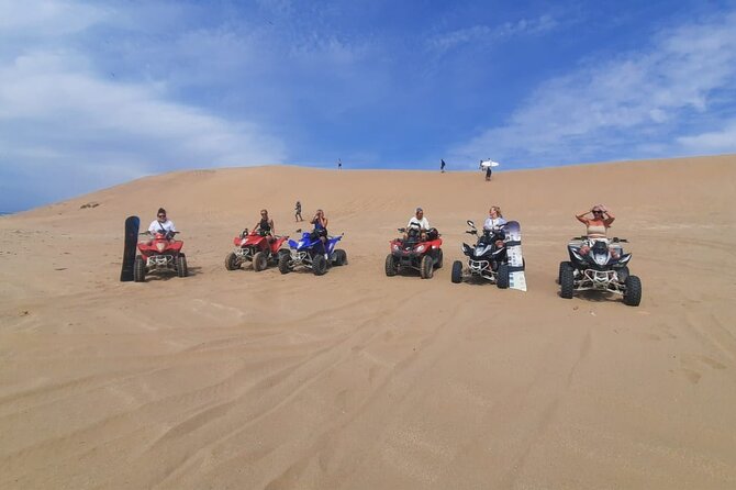 Quad Bike and Sandboarding on Sand Dunes Wild Beach - Passing traditional Berber villages