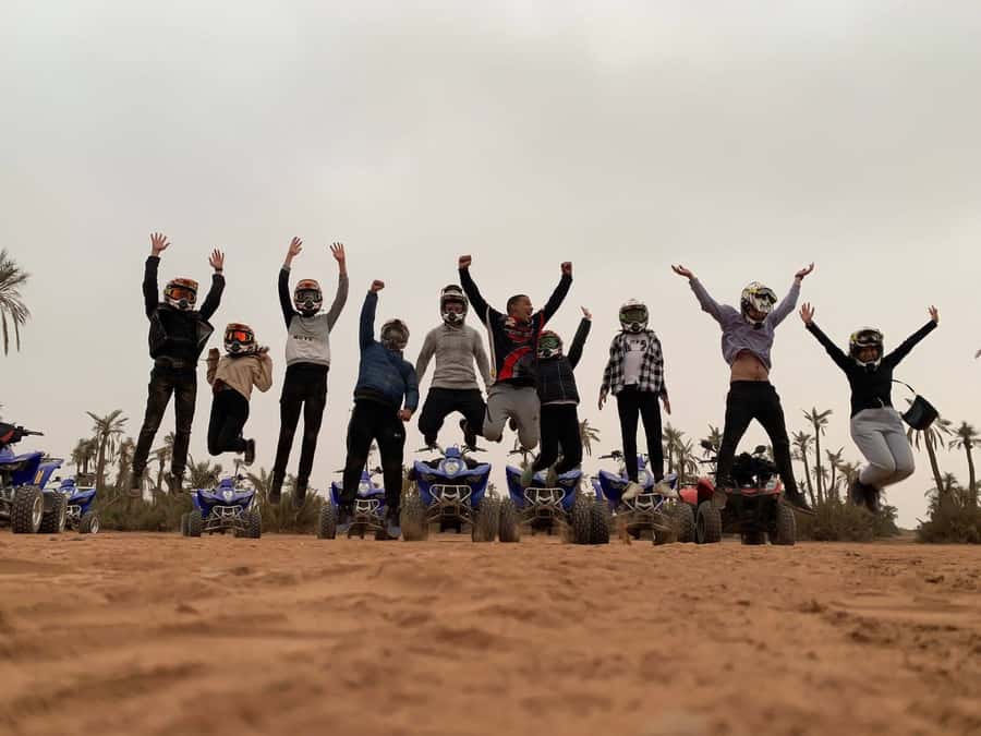 Quad biking adventure in Marrakech - Riding through palms, hills, and rocky desert