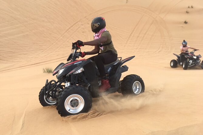 Quad biking tour with or without pick and drop(Abu dhbai ) - Riding behind the guide vehicle
