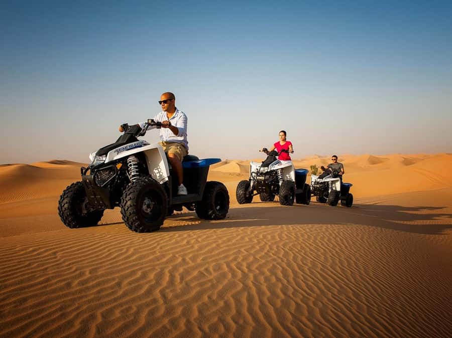 Ras Al Khaimah: Guided Quad Bike Tour - Following the Guide Into the Desert