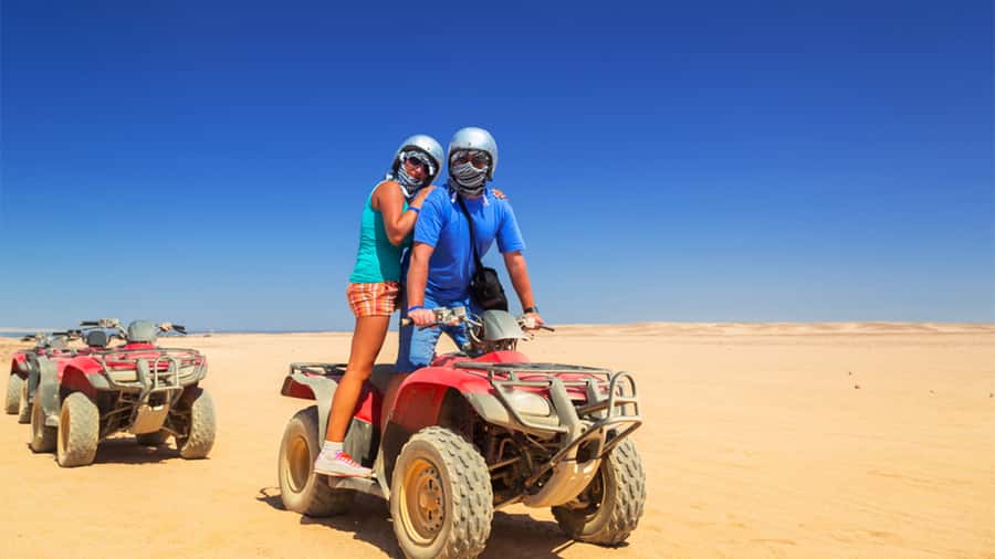 Sharm El Sheikh: Quad Biking trip with Authentic Bedouin Tea - Getting on the quad