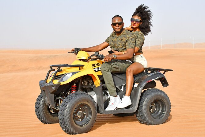 Sunset Desert Safari Quad bike Camel ride Sand Board & BBQ Dinner - Moving from Al Lahbab to the Al Awir camp