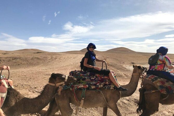 Sunset in Agafay: Dinner, Camel, Quad-Book Adventure with Viator - Small-group transport and practical comfort
