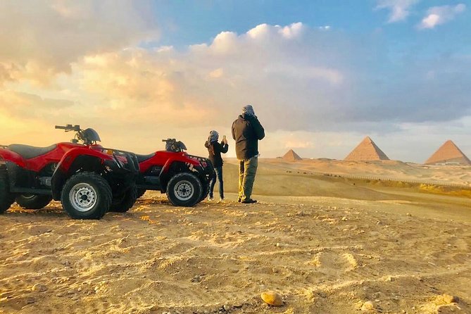 Top rated ATV quad bike at the Desert of Giza Pyramids - Riding an ATV with the Pyramids ahead