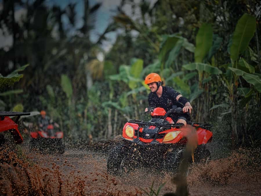 Ubud: Gorilla Face Quad Bike, Jungle Swing, Waterfall & Meal - Goa Raja Waterfall and its shafts of sunlight