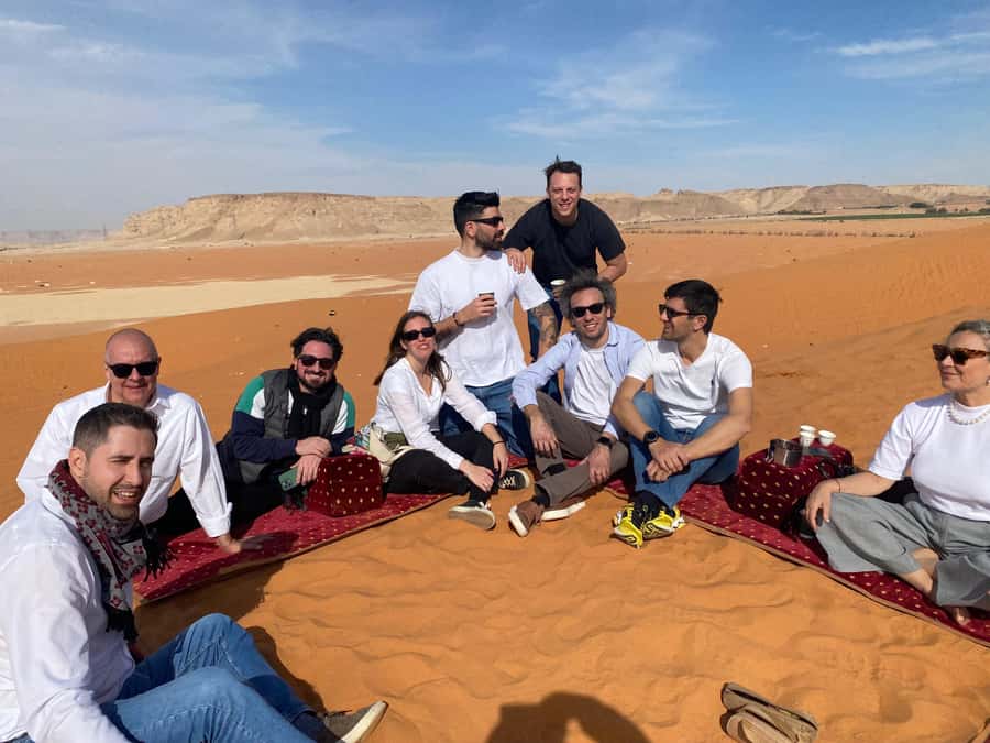 VIP Red Dunes: Camel, Quads, Private Tour & Coffee - Quad biking across open sand